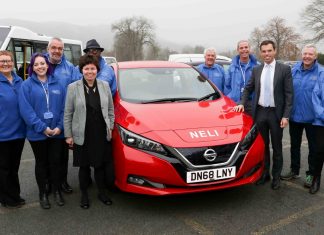 South Denbighshire Community Partnership Manager Margaret Sutherland, left, at the launch of the Edeyrnion Community Car Club in Corwen with their brand new Nissan Leaf, christened Neli, with Clwyd South AM Ken Skates and MP Susan Elan Jones.
